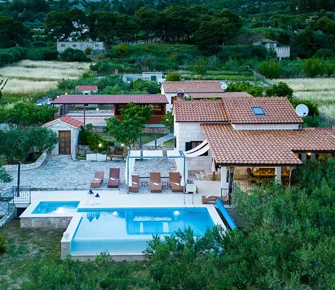 Villa with a private pool and spacious outdoor area, with mountains around it